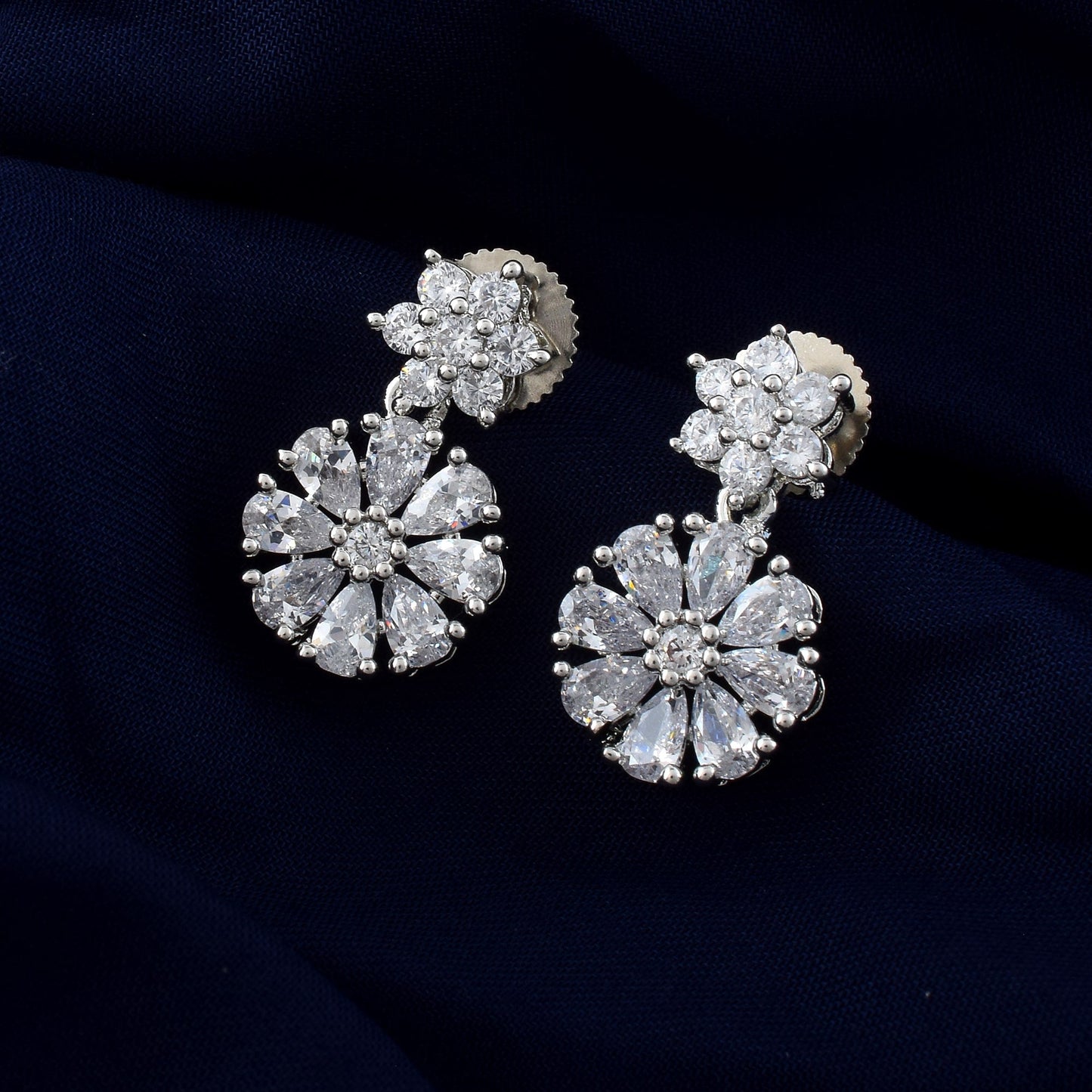 Silver Color American Diamond Earrings In Spiral Floral Studded Look