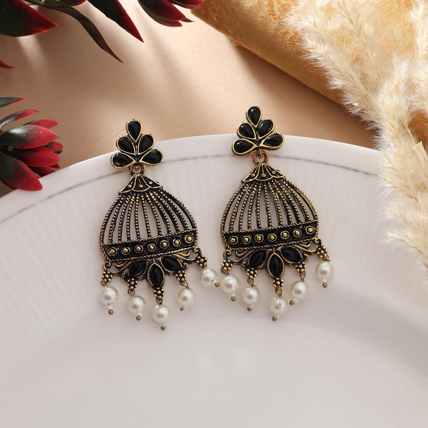 Black Color Oxidised Earrings With Silver Plating And Traditional Carving Design