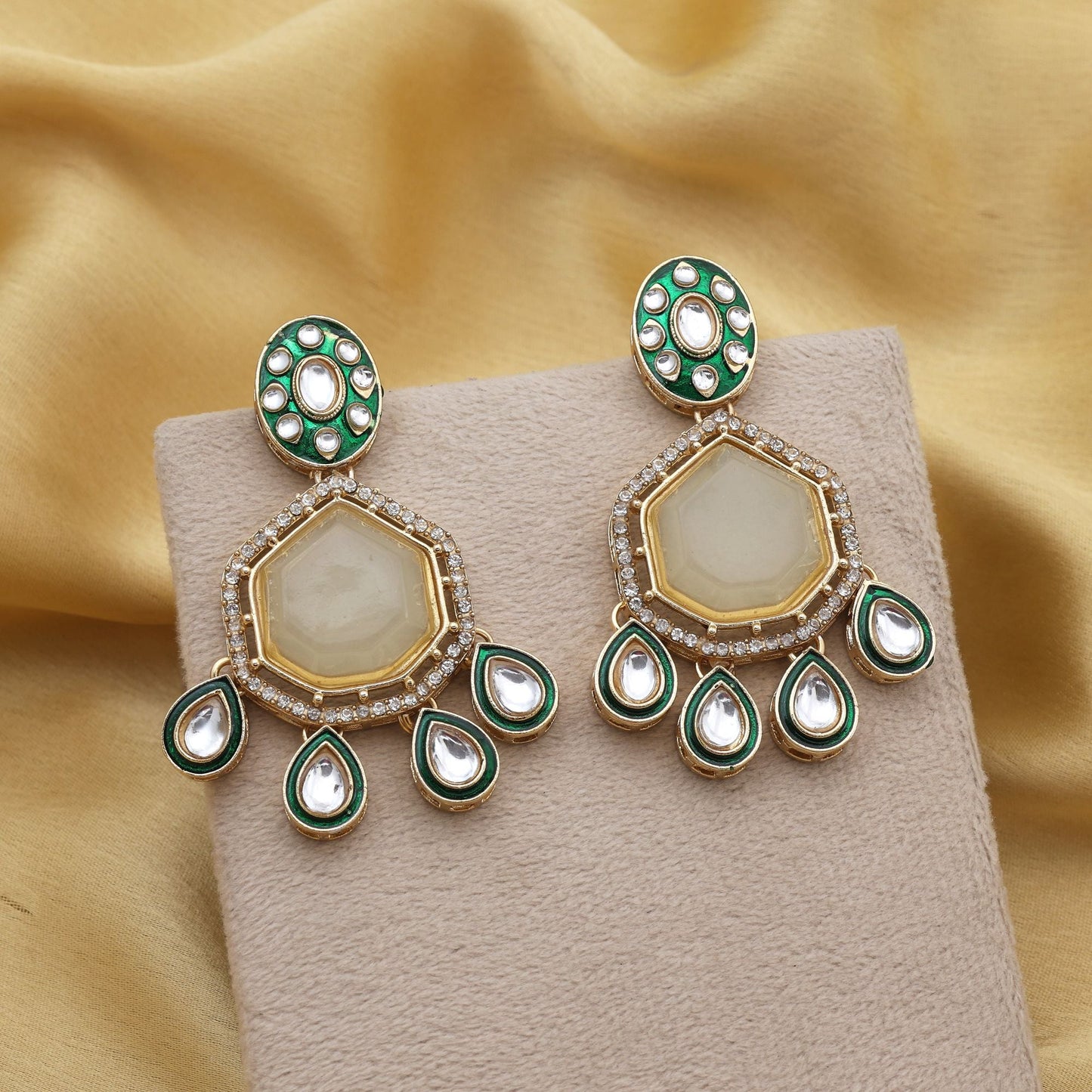 Elegant Off White Color Kundan Earrings With Traditional Stones Ideal For Classic Occasions