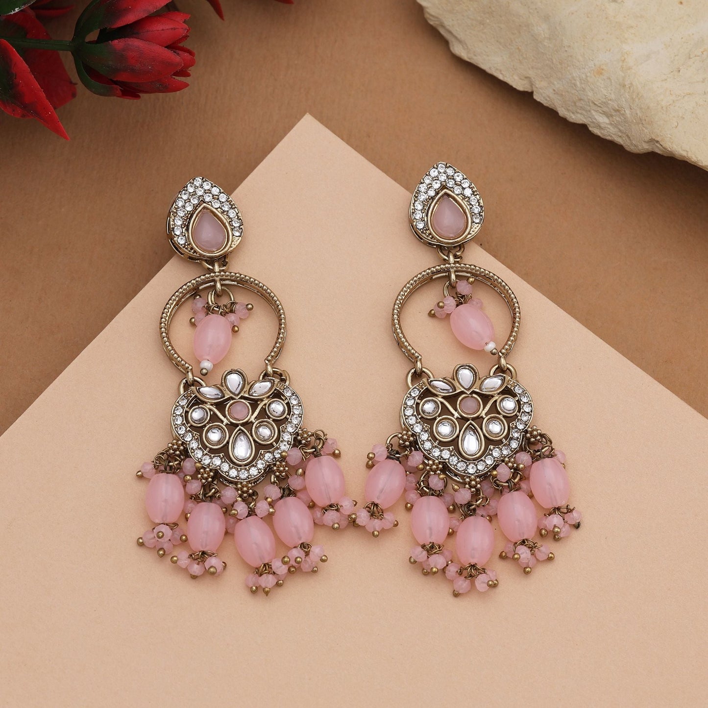 Stylish Pink Color Kundan Earrings With Gold Plated Finish Perfect For Celebrations