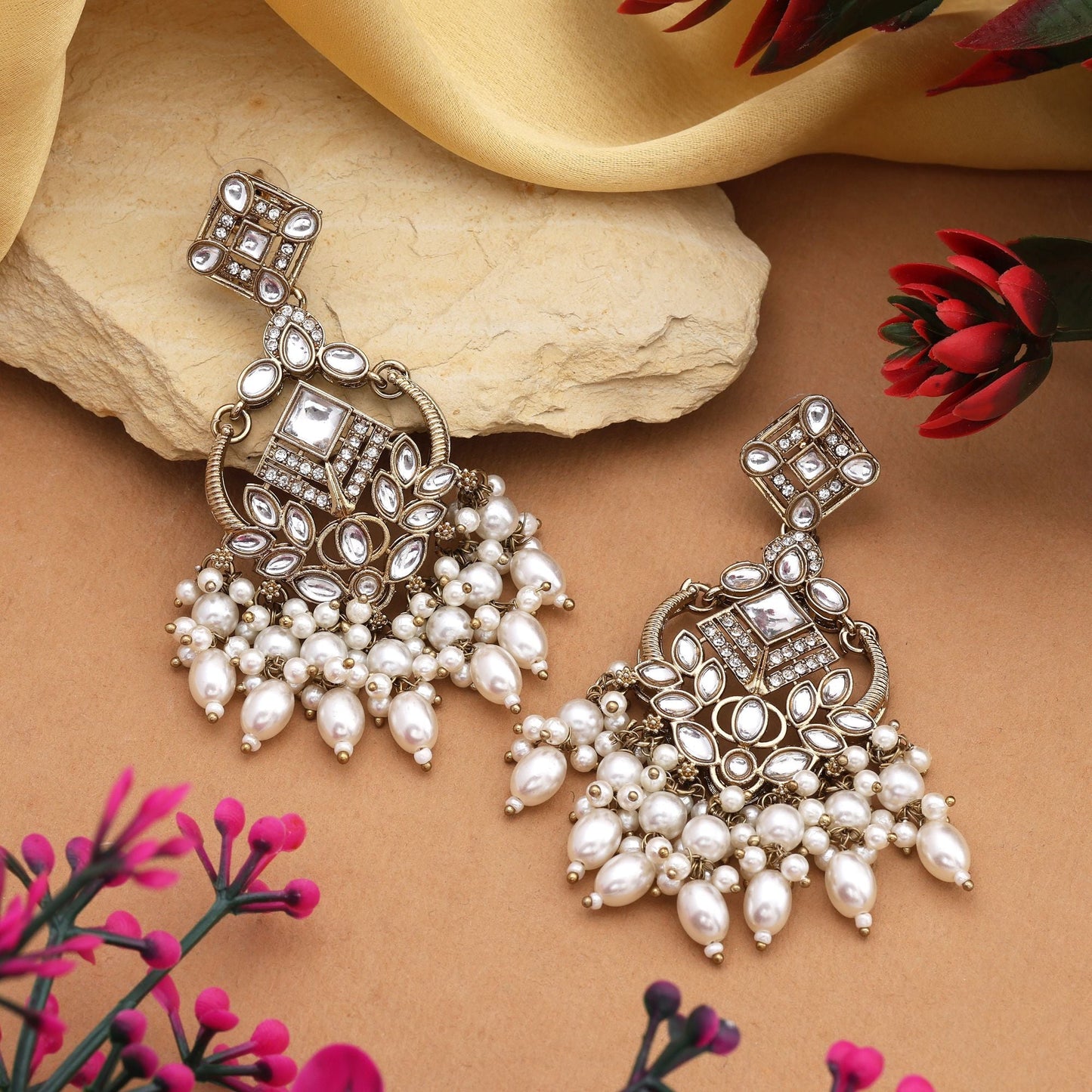 Graceful White Color Kundan Earrings With Gold Polish Perfect For Special Occasions