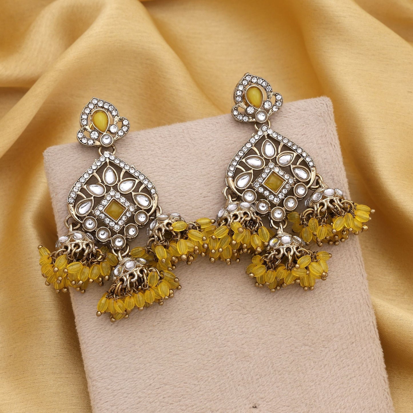 Bright Yellow Color Kundan Earrings With Stone Detailing For Wedding Functions