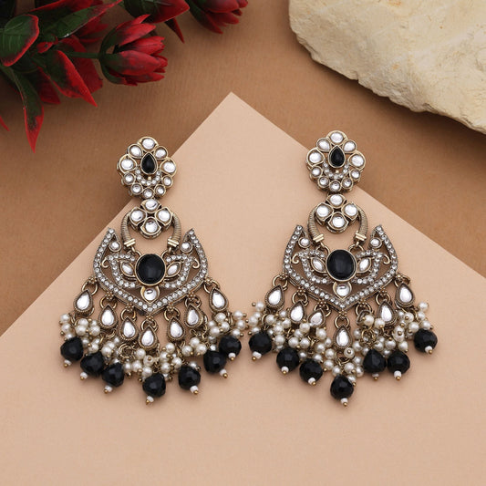 Elegant Black Color Kundan Earrings With Detailed Design Perfect For Wedding Wear