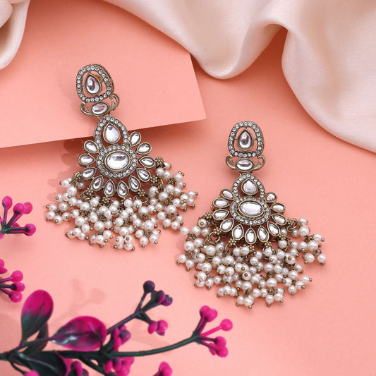 Beautiful White Color Kundan Earrings With Gold Detailing For Timeless Fashion