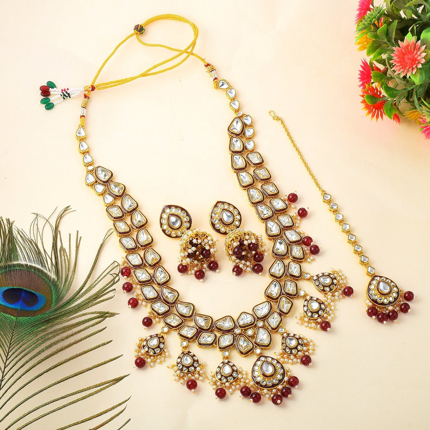 Glamorous Maroon Color Kundan Necklace Set With Gold Highlights