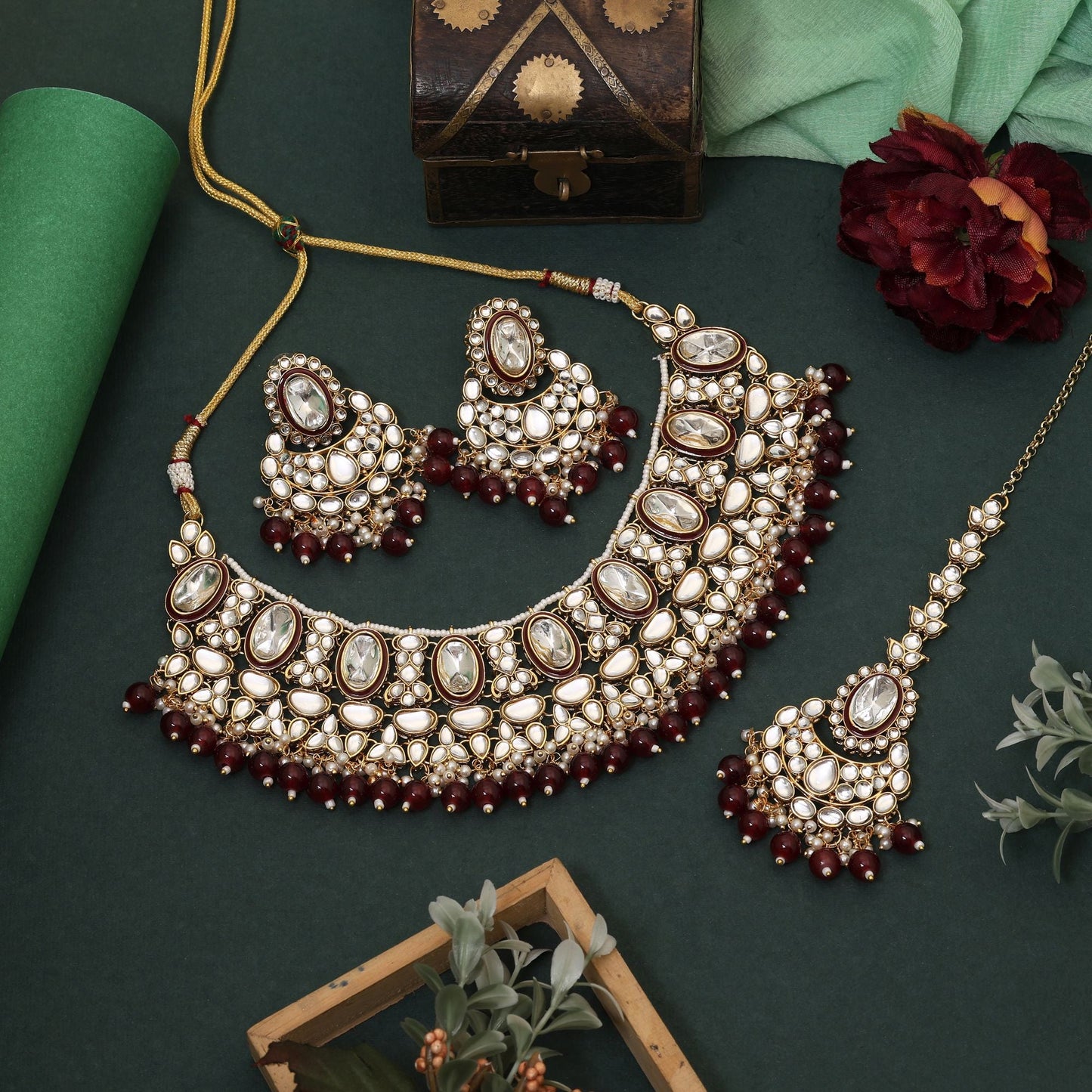Beautiful Maroon Color Kundan Necklace Set Designed For Engagements, Festivals, And Bridal Occasions