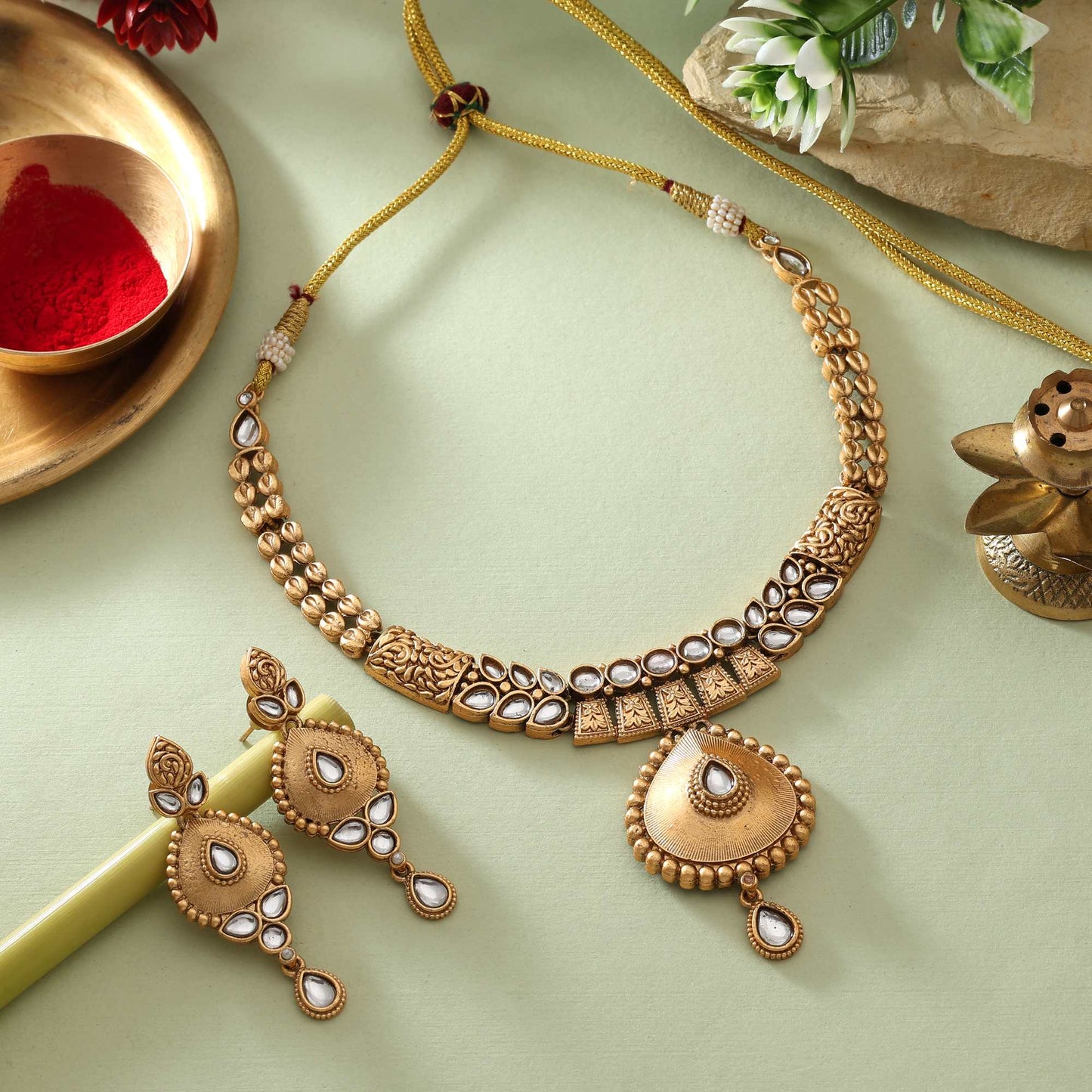 Stunning White Color Matte Gold Necklace Set Accented With Crystal Adornments