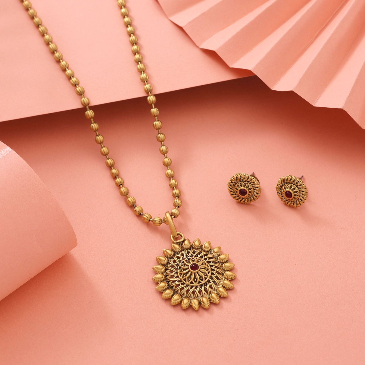 Elegant Rani Color Matte Gold Necklace Set With Artistic Floral Embellishments