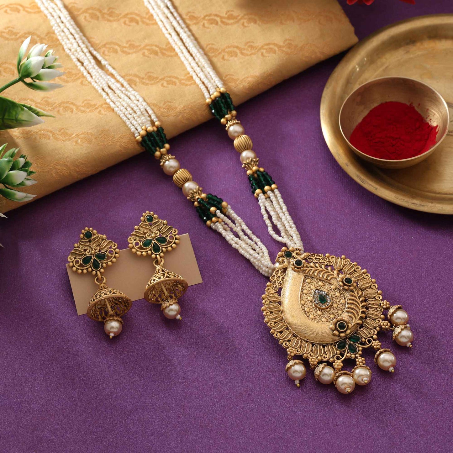 Radiant Green Color Matte Gold Necklace Set Adorned With Precious Stone Artistic Work