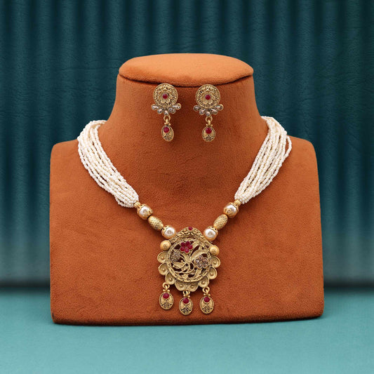 Exquisite Rani Color Matte Gold Necklace Set Featuring Handcrafted Meena Art And Stones