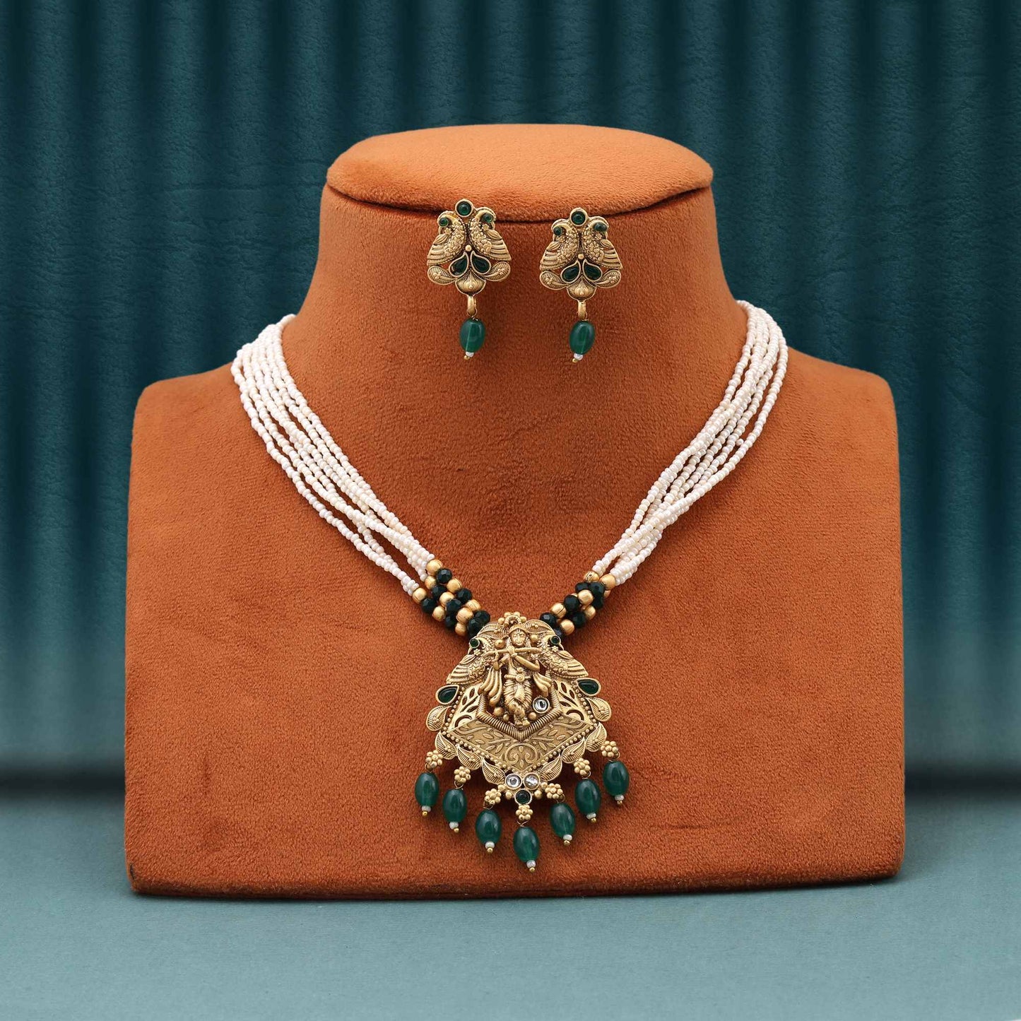 Captivating Green Color Matte Gold Necklace Set With Intricate Peacock Feather Inspired Design