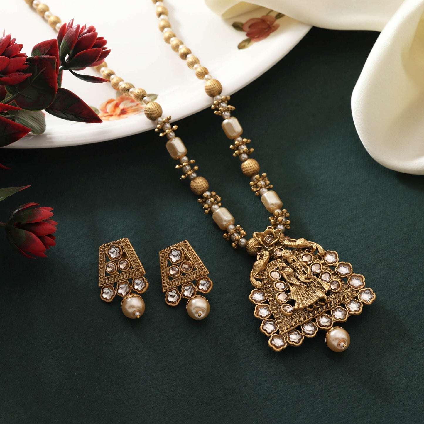 Grand Gold Color Matte Gold Necklace Set With Antique Look And Fine Stone Detailing