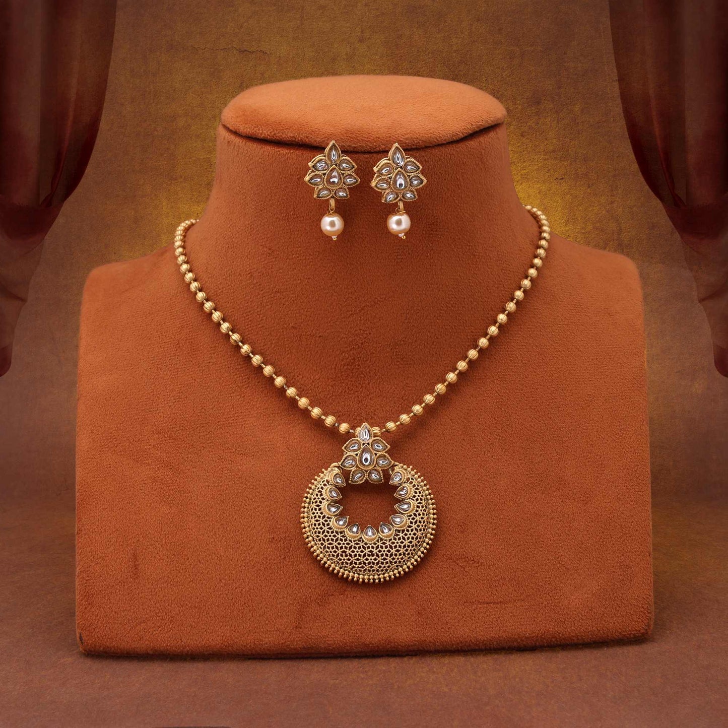 Premium Gold Color Matte Gold Necklace Set Featuring Artistic Floral And Leaf Pattern Design