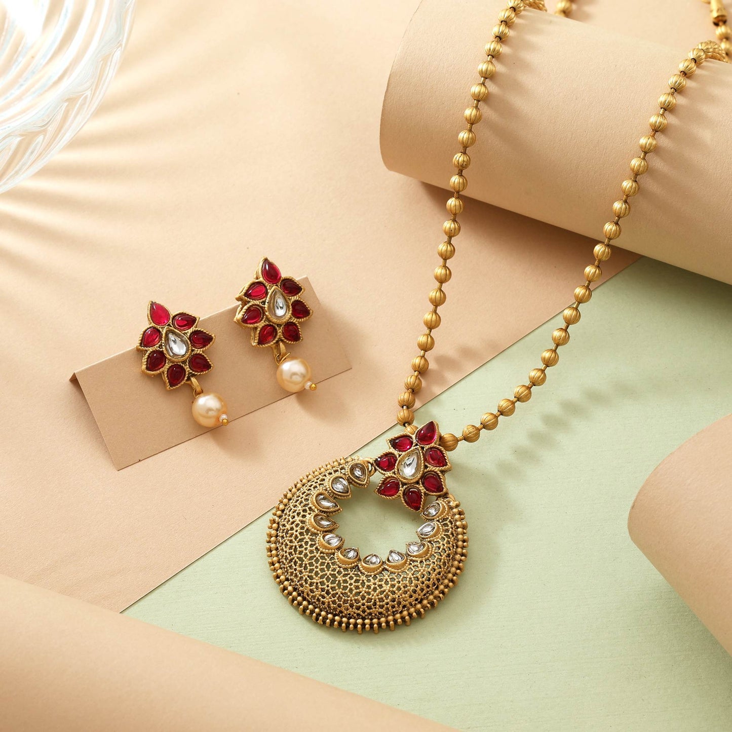 Beautiful Rani Color Matte Gold Necklace Set With Antique Finish And Meenakari Style Details