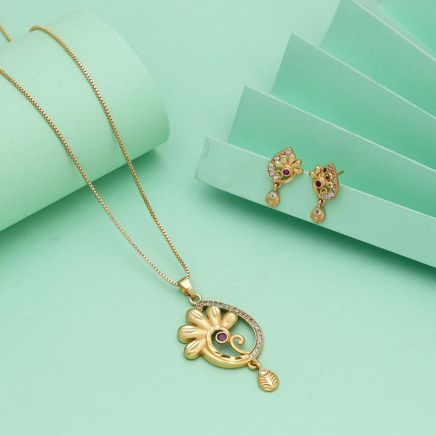 Gold Color Chain Pendant With Earring Offering Polished Look For Festive Celebrations