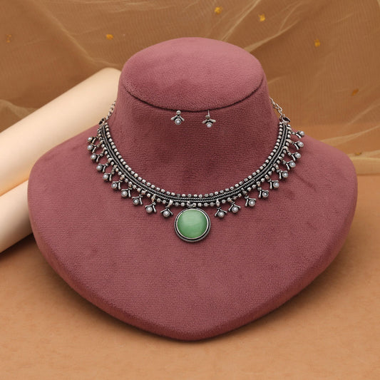 Pista Green Color Oxidised Necklace Set Featuring Classic Tribal Artwork