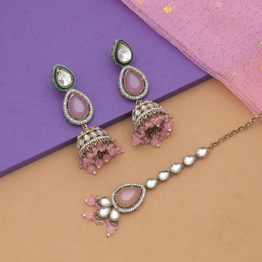 Charming Light Pink Color Kundan Earrings Tikka Set With Stylish Bridal Artwork