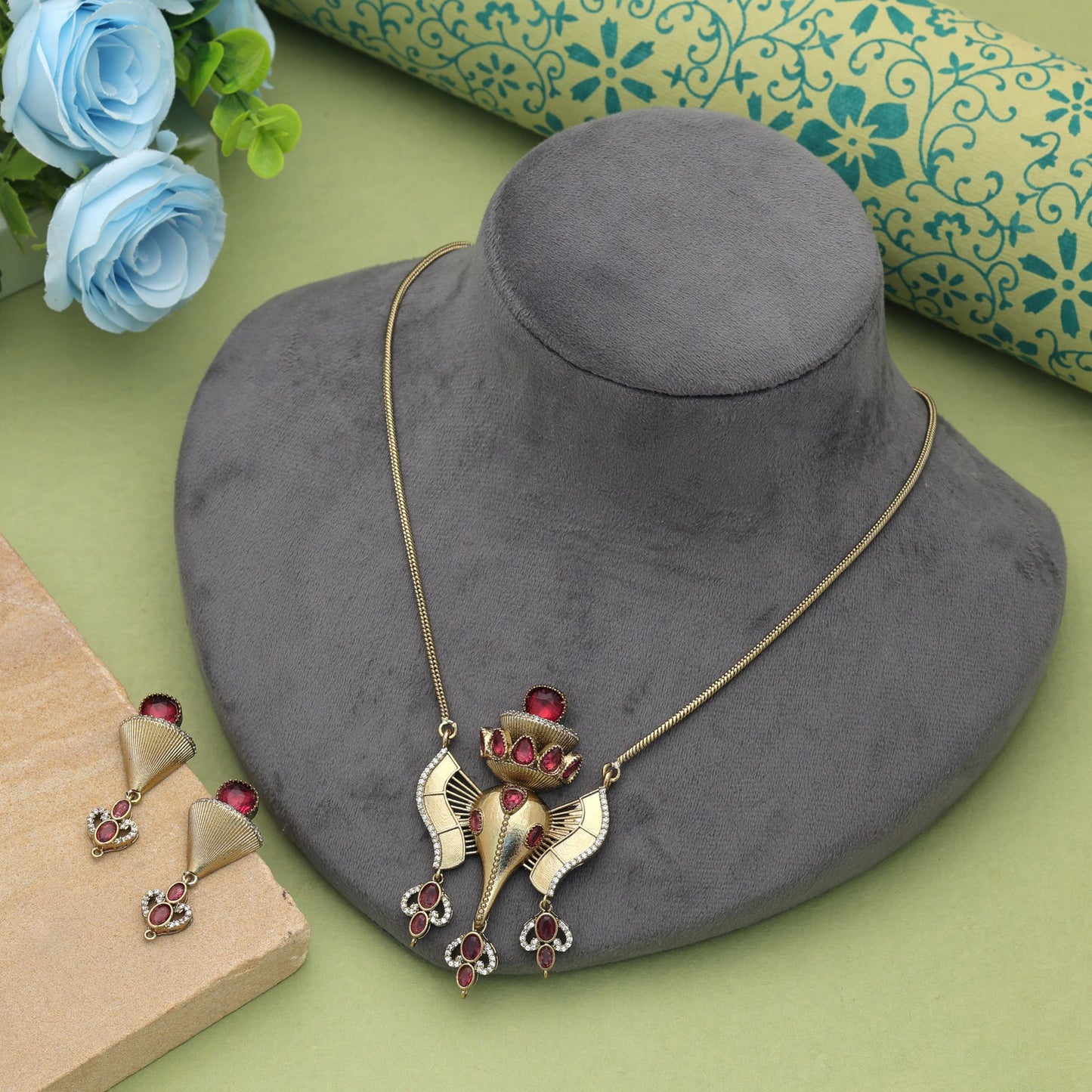 Beautiful Rani Color Lord Ganesha American Diamond Necklace Set For Festive Wear