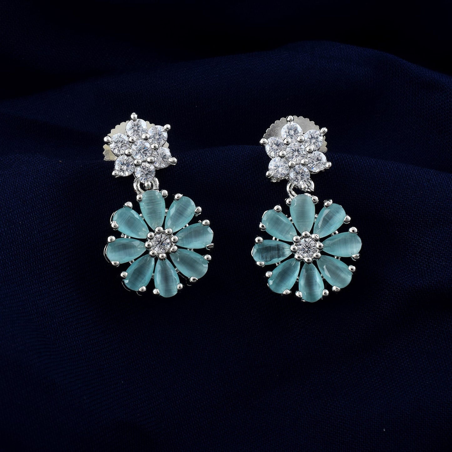 Rama Green Color American Diamond Earrings With Curved Leaf Drop Pattern