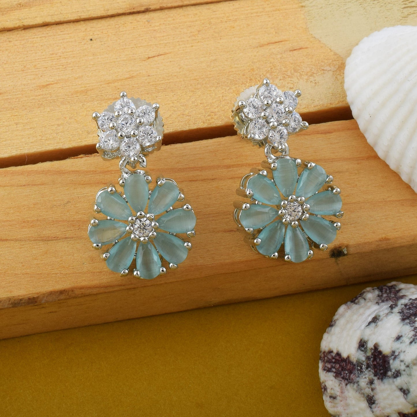 Rama Green Color American Diamond Earrings With Curved Leaf Drop Pattern