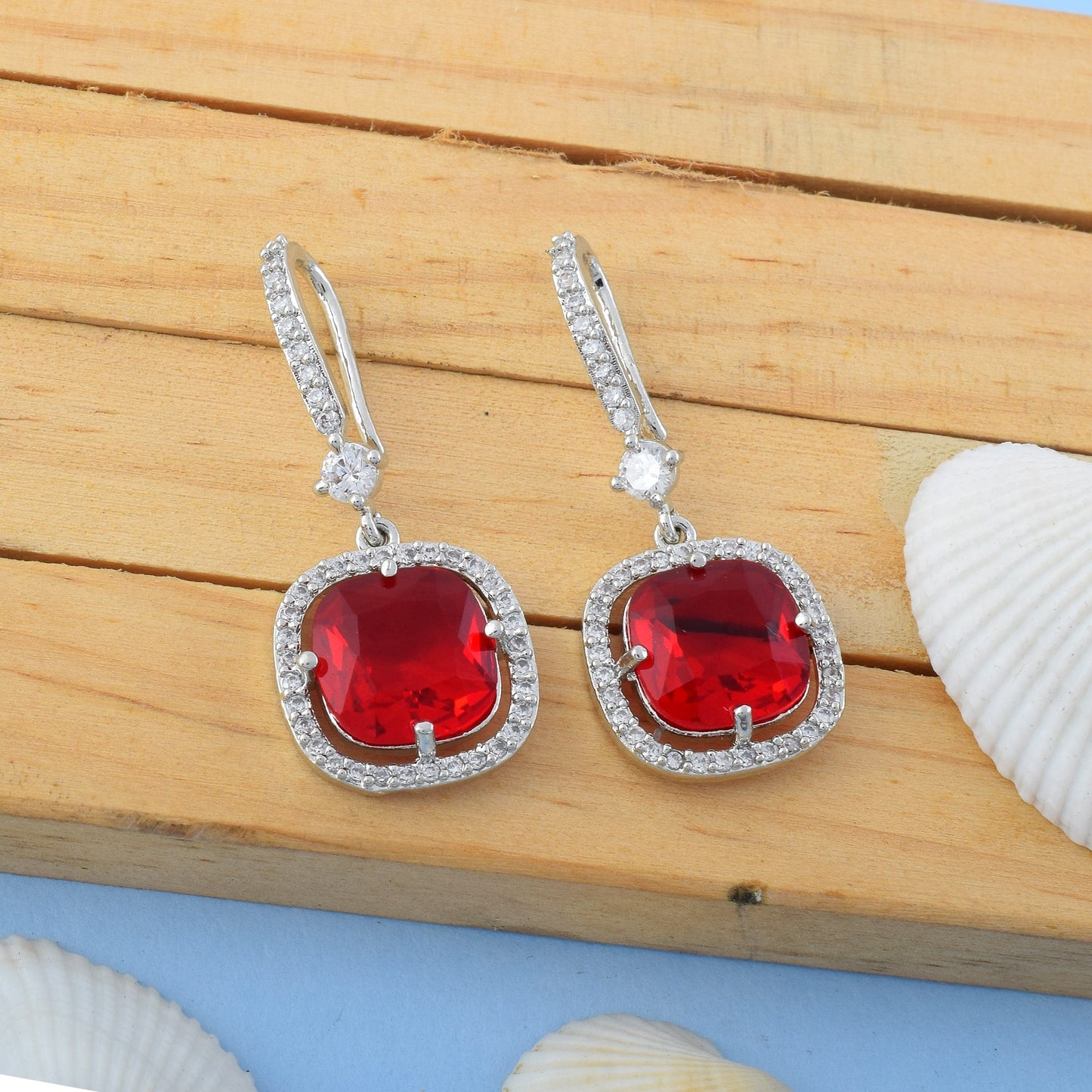 Red Color American Diamond Earrings In Twisted Loop Inspired Statement Design