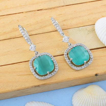 Rama Green Color American Diamond Earrings With Artistic Spiral Crystal Design