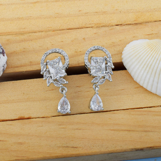 Silver Color American Diamond Earrings With Twinkle Round Dangling Gem Look