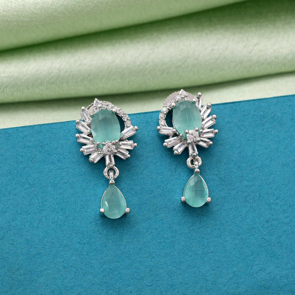 Pista Green Color Stylish Stone American Diamond Earrings For Brides And Fashion Lovers | FEMNARI