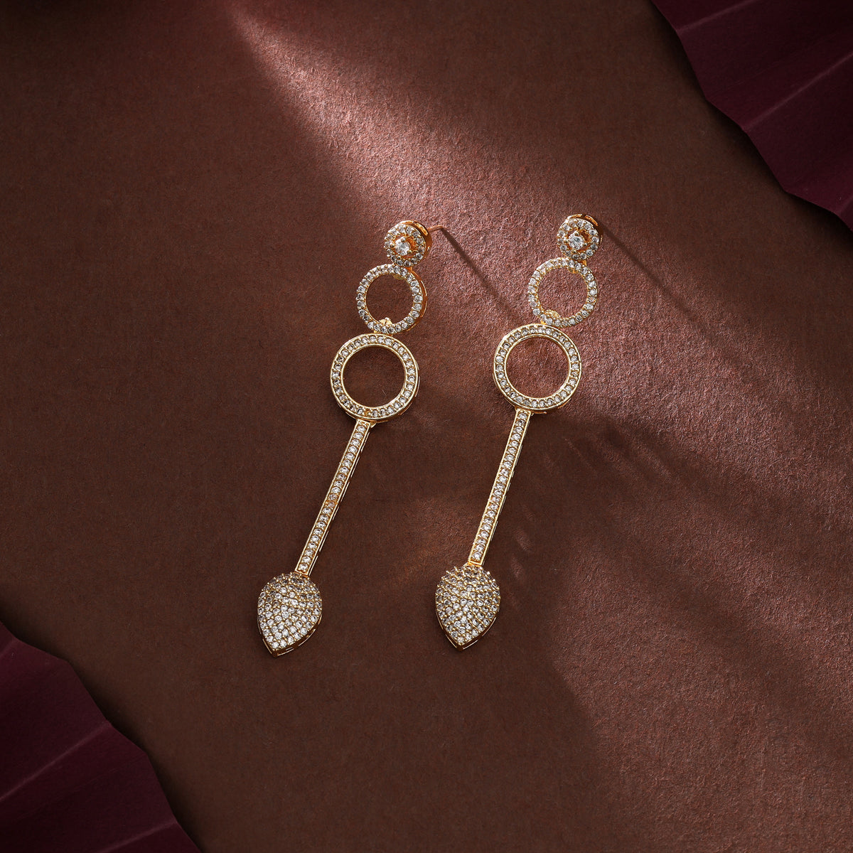 Elegant Royal Gold Color American Diamond Hanging Earrings For Celebration Wear