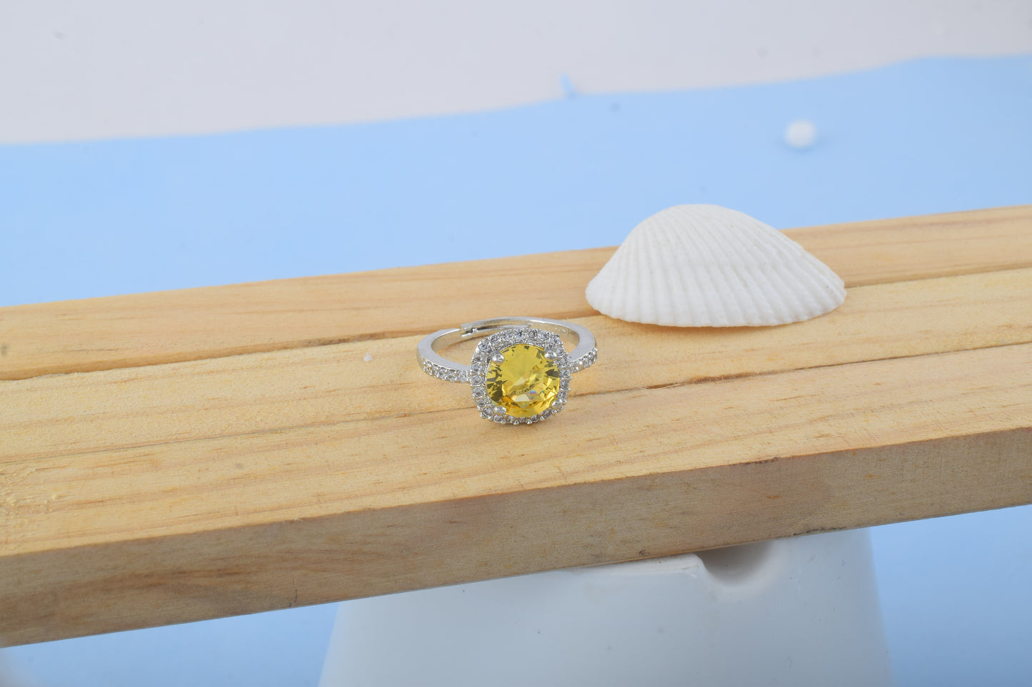 Dazzling Yellow Color American Diamond Ring With Cheerful Design Statement