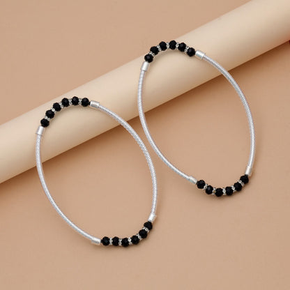 Trendige schwarze, oxidierte Fußkette für Boho-Party-Styling
