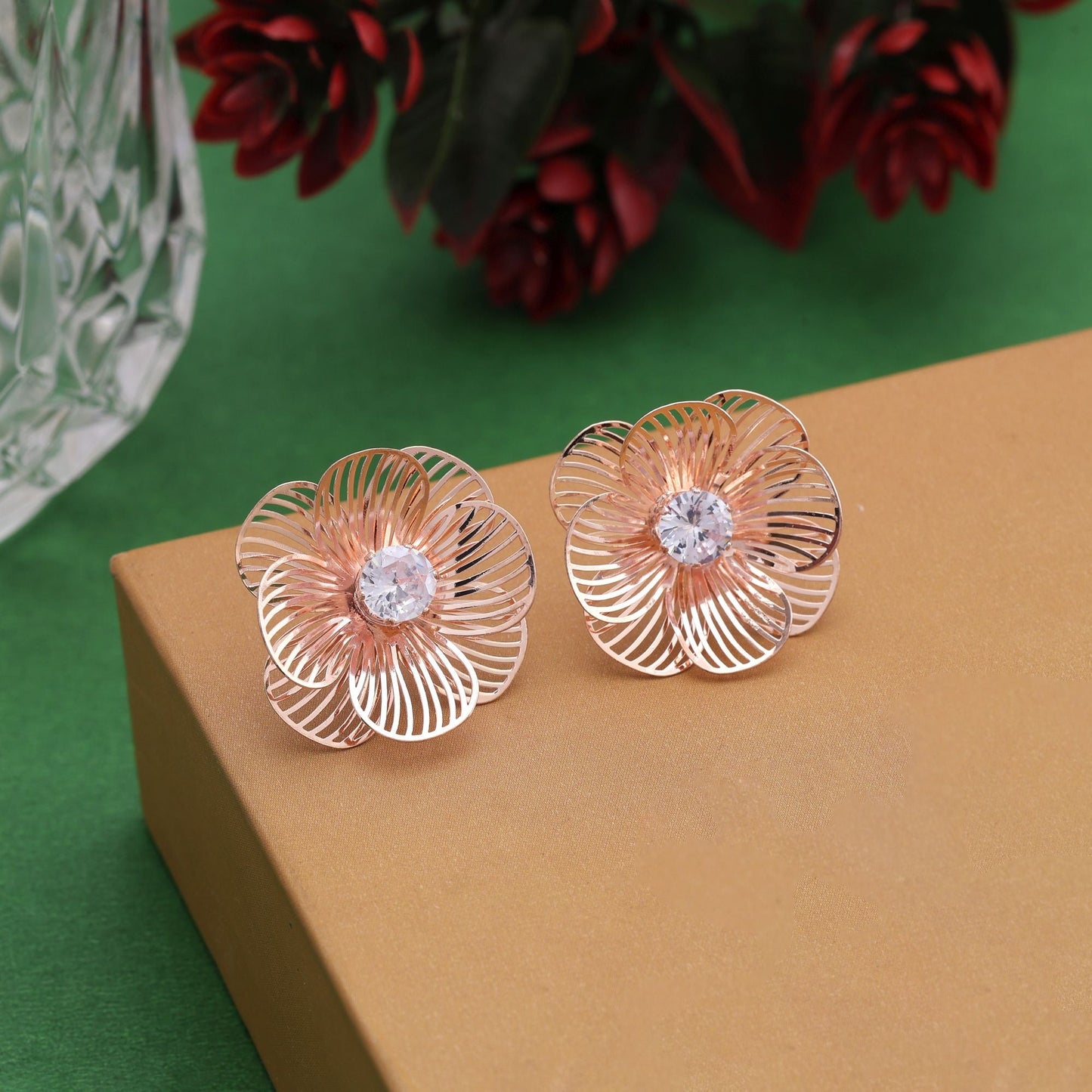 Beautiful Rose Gold Color Anti Tarnish Earrings With Stone Detailing For Festive Wear