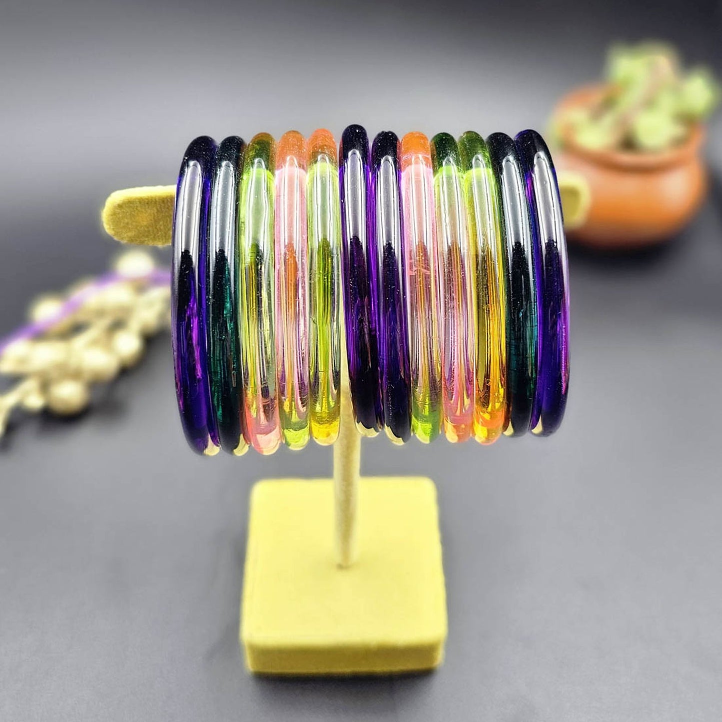 Assorted Color 28 Pieces Of Jelly Glass Bangles Featuring Beautiful Festive Ethnic Design