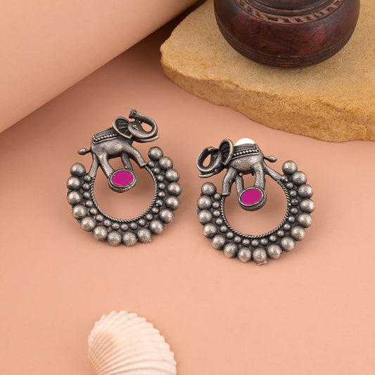Classic Rani Color Oxidised Earrings With Floral Design And Smooth Finish