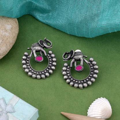 Classic Rani Color Oxidised Earrings With Floral Design And Smooth Finish