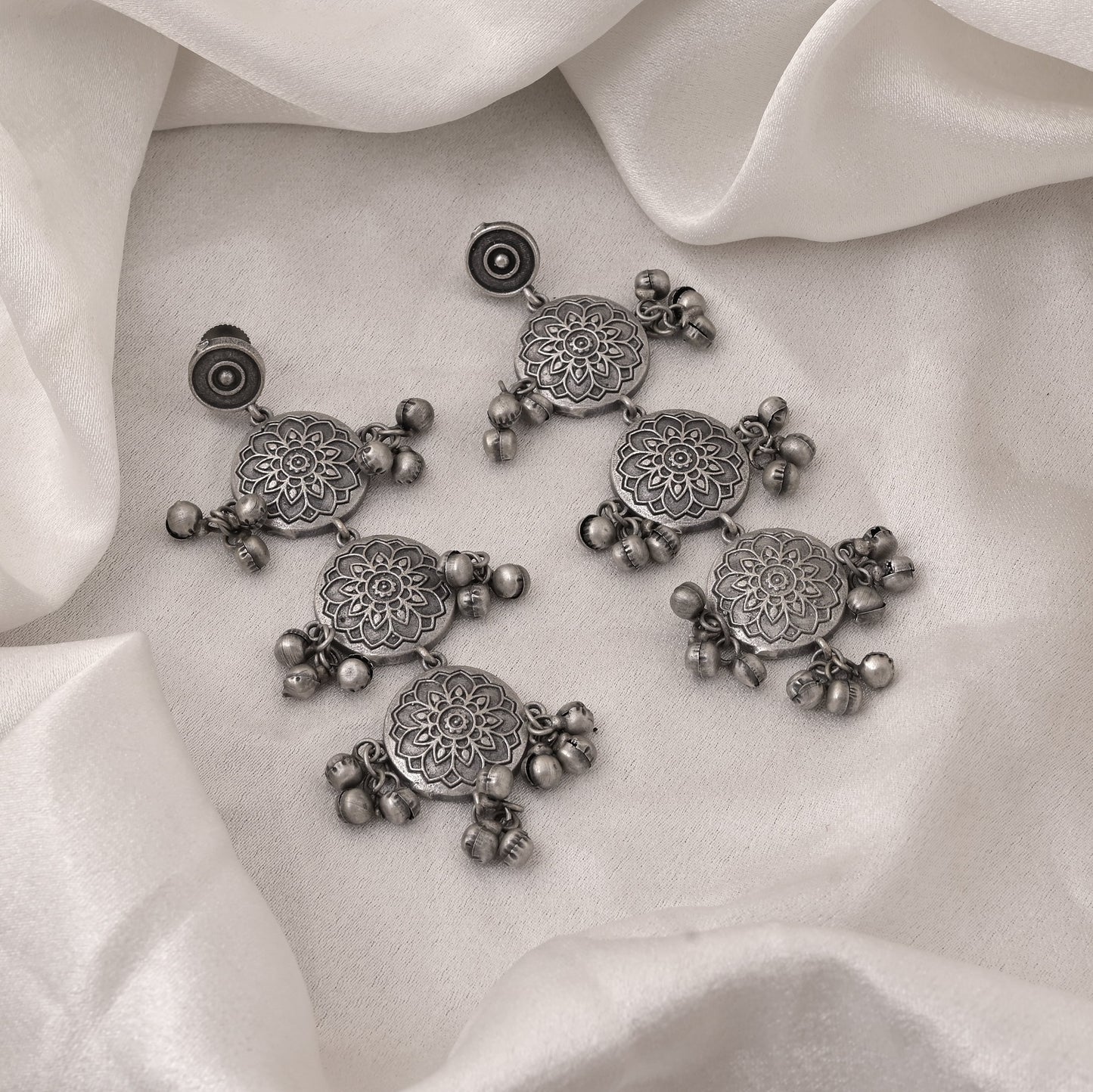 Oxidised Earrings In Silver Color With Intricate Embossed Artwork
