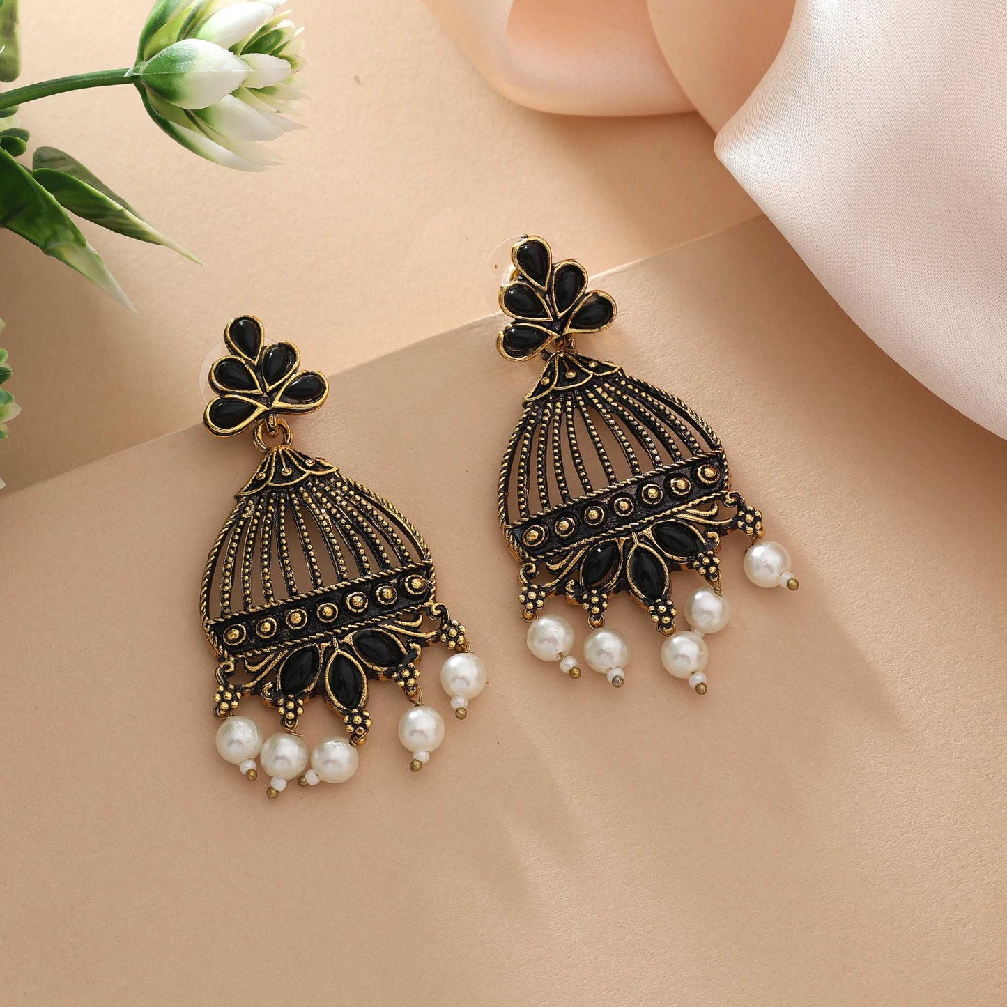 Black Color Oxidised Earrings With Silver Plating And Traditional Carving Design