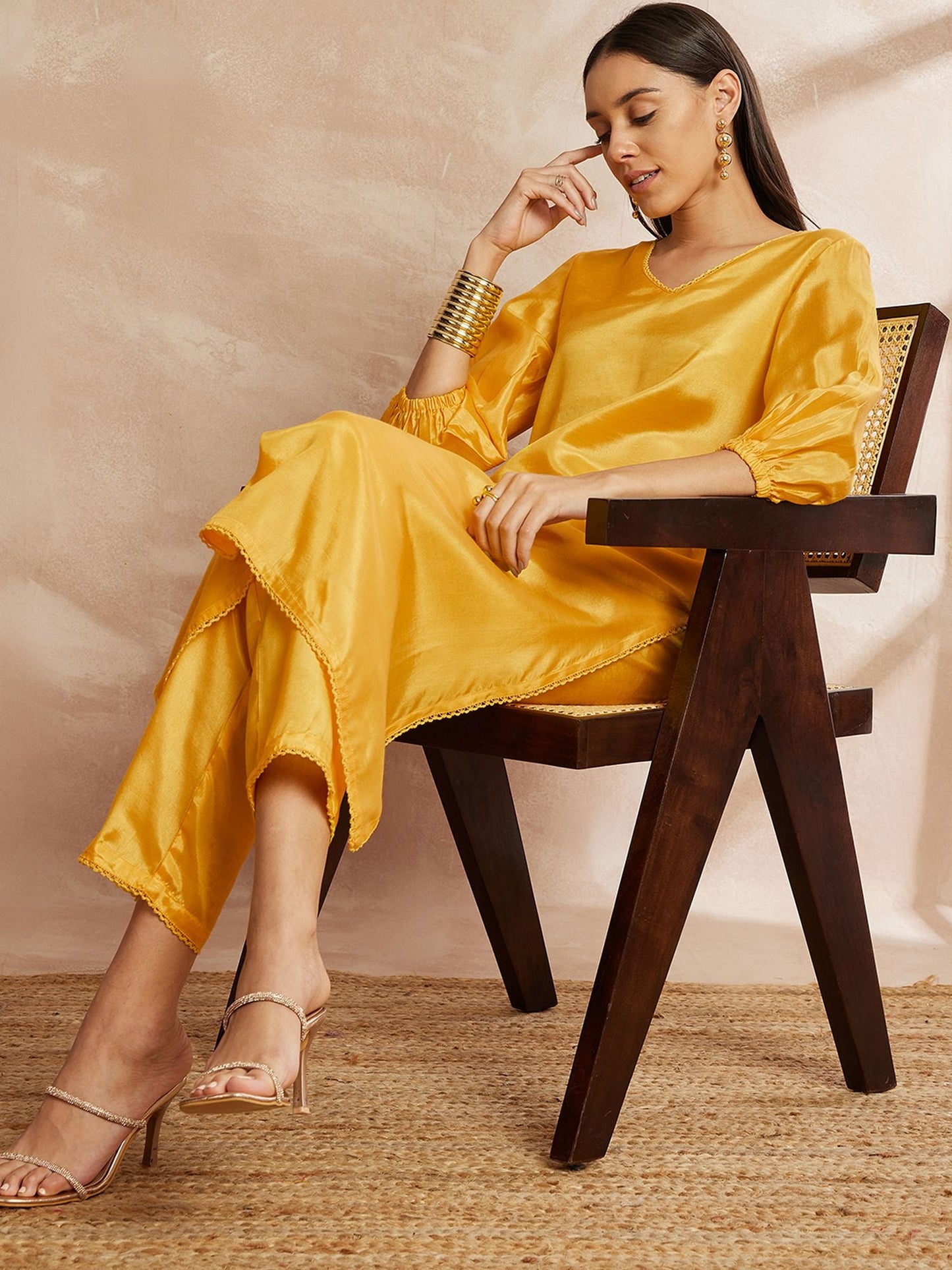 Yellow Color V-Neck Three-Quarter Sleeves Puffed Sleeves A-Line Kurta with Trousers