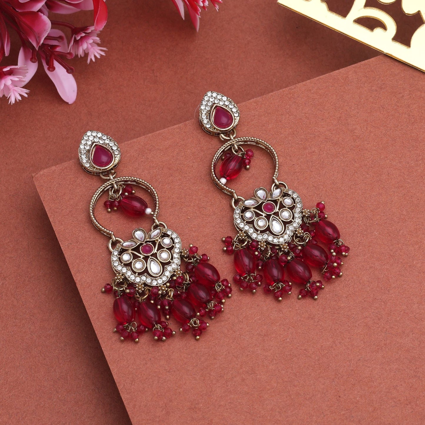 Beautiful Rani Color Kundan Earrings With Sparkling Stones For Special Occasions