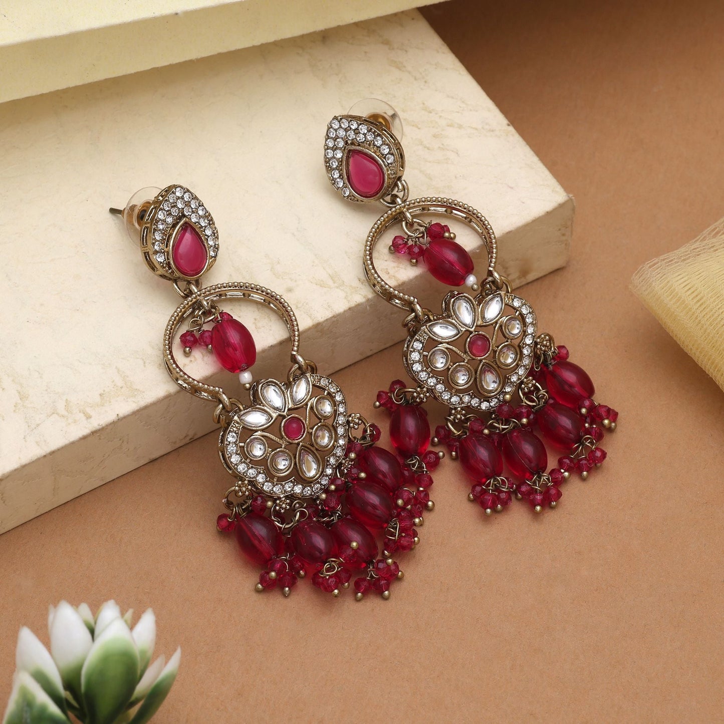 Beautiful Rani Color Kundan Earrings With Sparkling Stones For Special Occasions