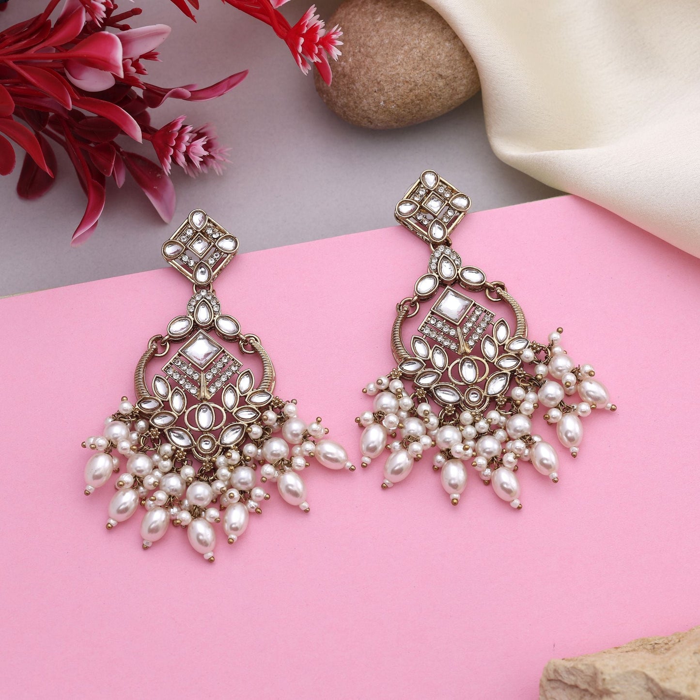 Graceful White Color Kundan Earrings With Gold Polish Perfect For Special Occasions