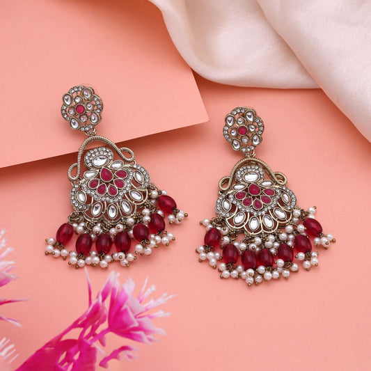 Gorgeous Rani Color Kundan Earrings With Intricate Stones For Bridal Attire