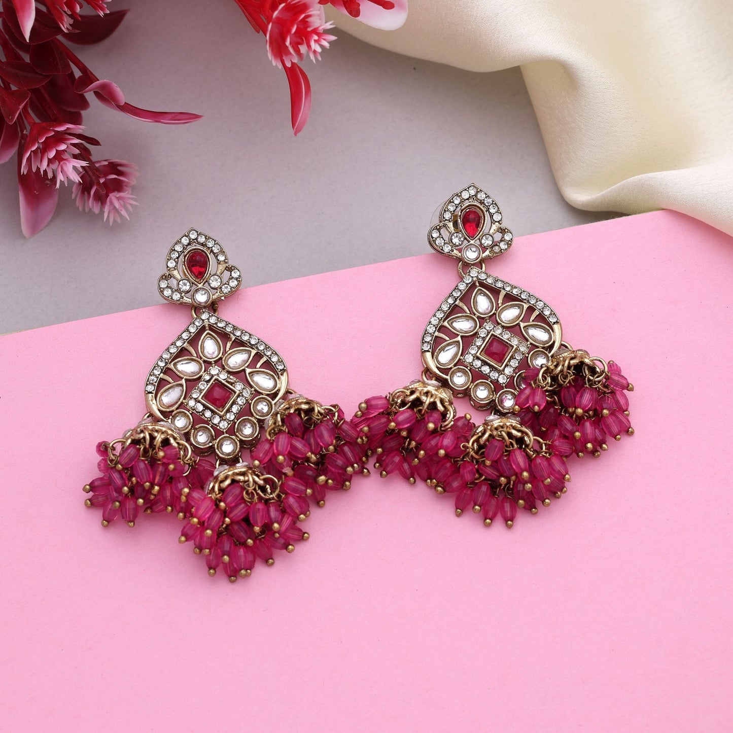 Beautiful Rani Color Kundan Earrings With Gold Finish Perfect For Indian Occasions