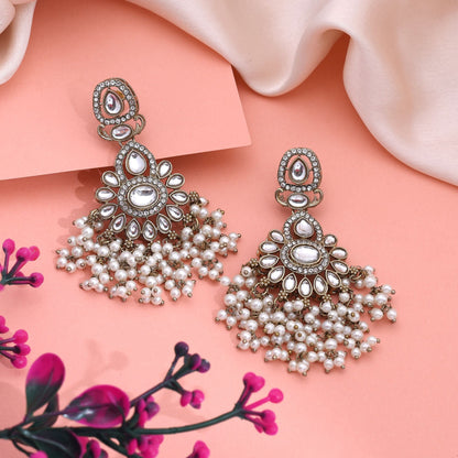 Beautiful White Color Kundan Earrings With Gold Detailing For Timeless Fashion