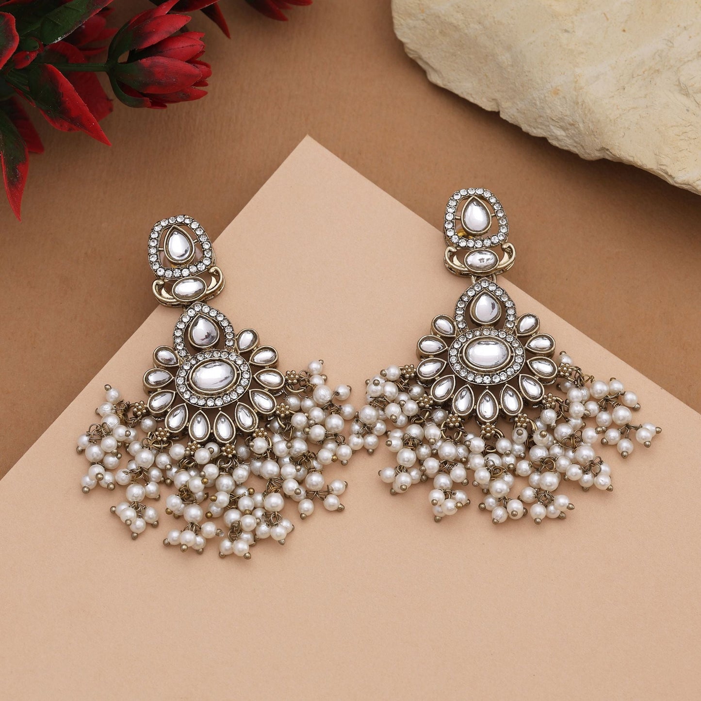 Beautiful White Color Kundan Earrings With Gold Detailing For Timeless Fashion