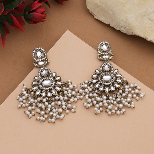 Beautiful White Color Kundan Earrings With Gold Detailing For Timeless Fashion