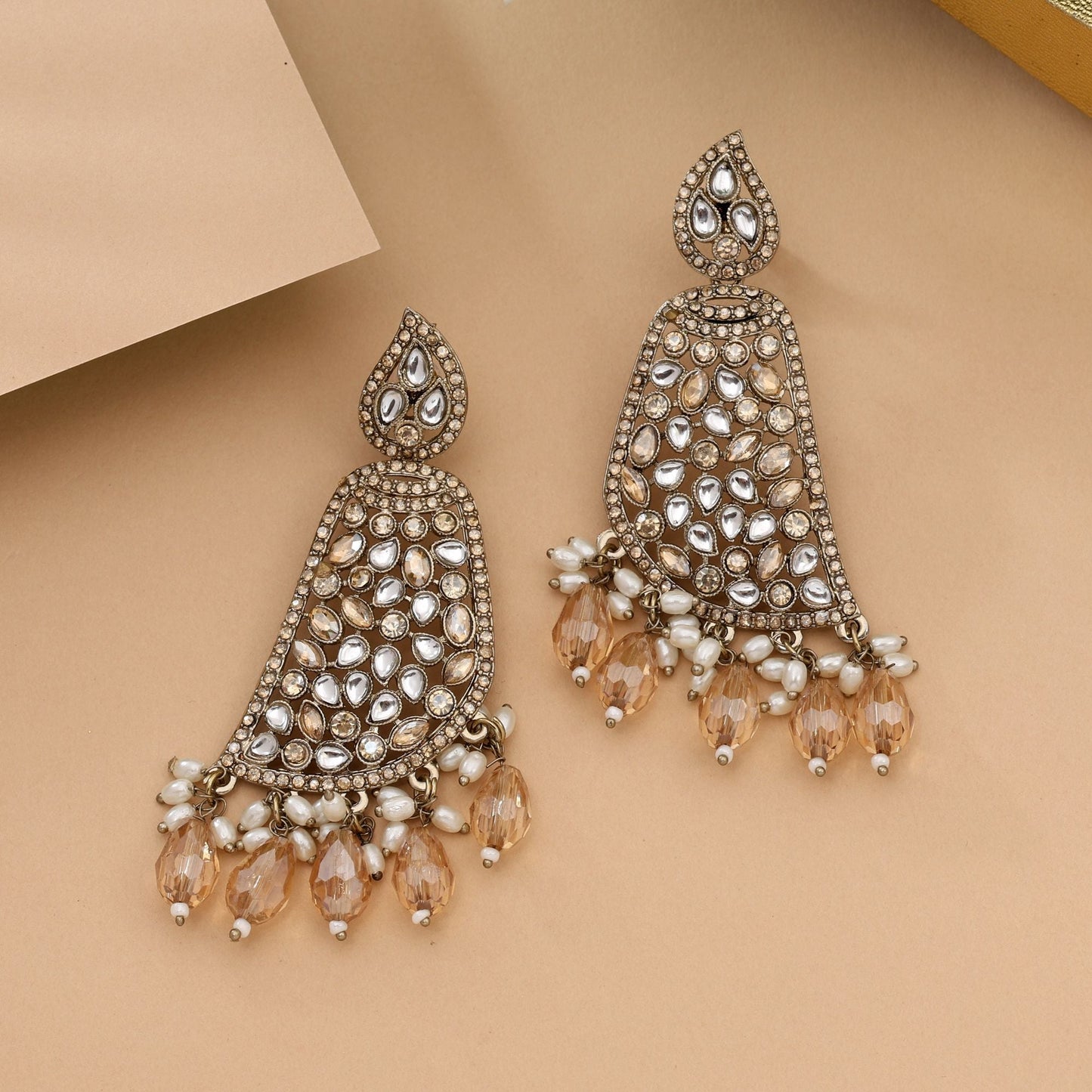 Shimmering Gold Color Kundan Earrings With Exquisite Craftsmanship And Finish