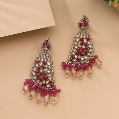 Attractive Rani Color Kundan Earrings Perfect For Bridal And Party Styling