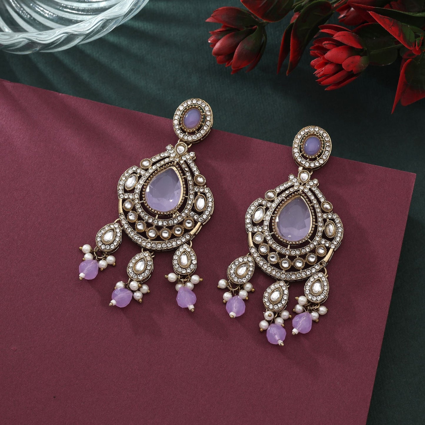 Graceful Purple Color Kundan Earrings With Detailed Stonework And Shine