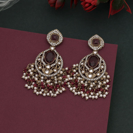 Elegant Magenta Color Kundan Earrings With Stylish Festive Appeal